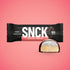 SNCK protein bar Vanilla Fluff & Flødebollen packaging with a pink background