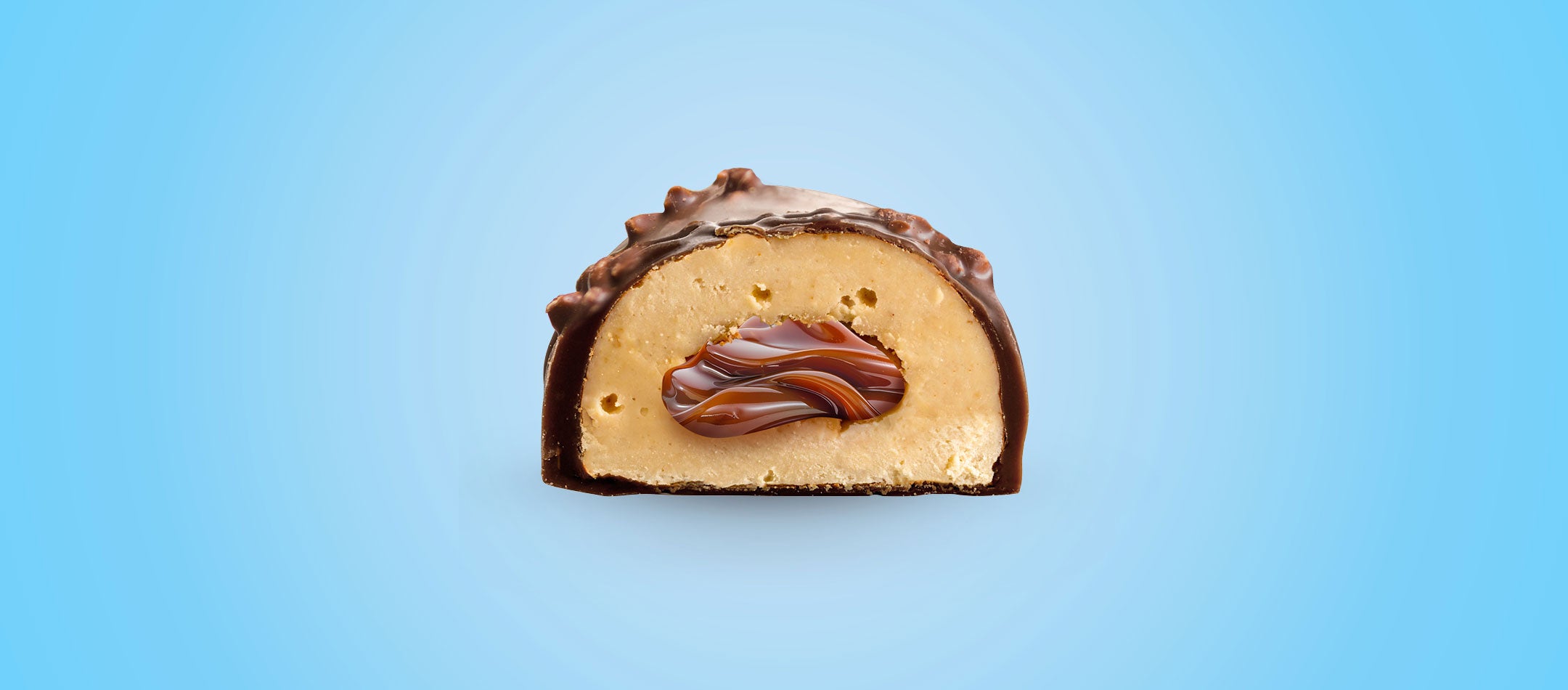 Cutaway view of Caramel Pop SNCK Bar on  a blue background